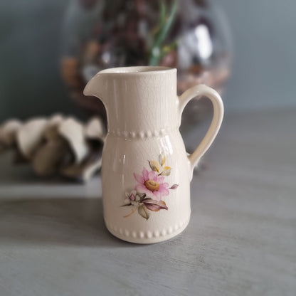 Vintage cream ceramic jug with pink floral design