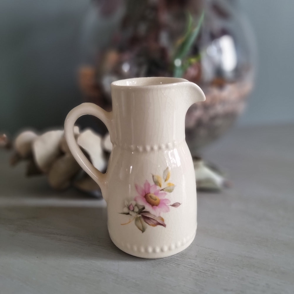 Vintage cream ceramic jug with pink floral design