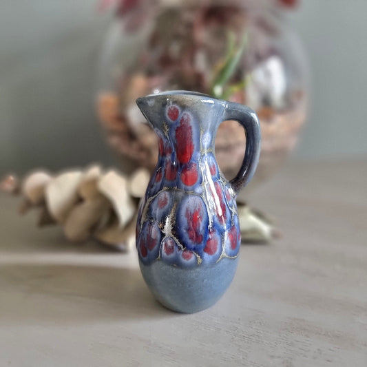 Vintage blue and red glaze studio pottery jug