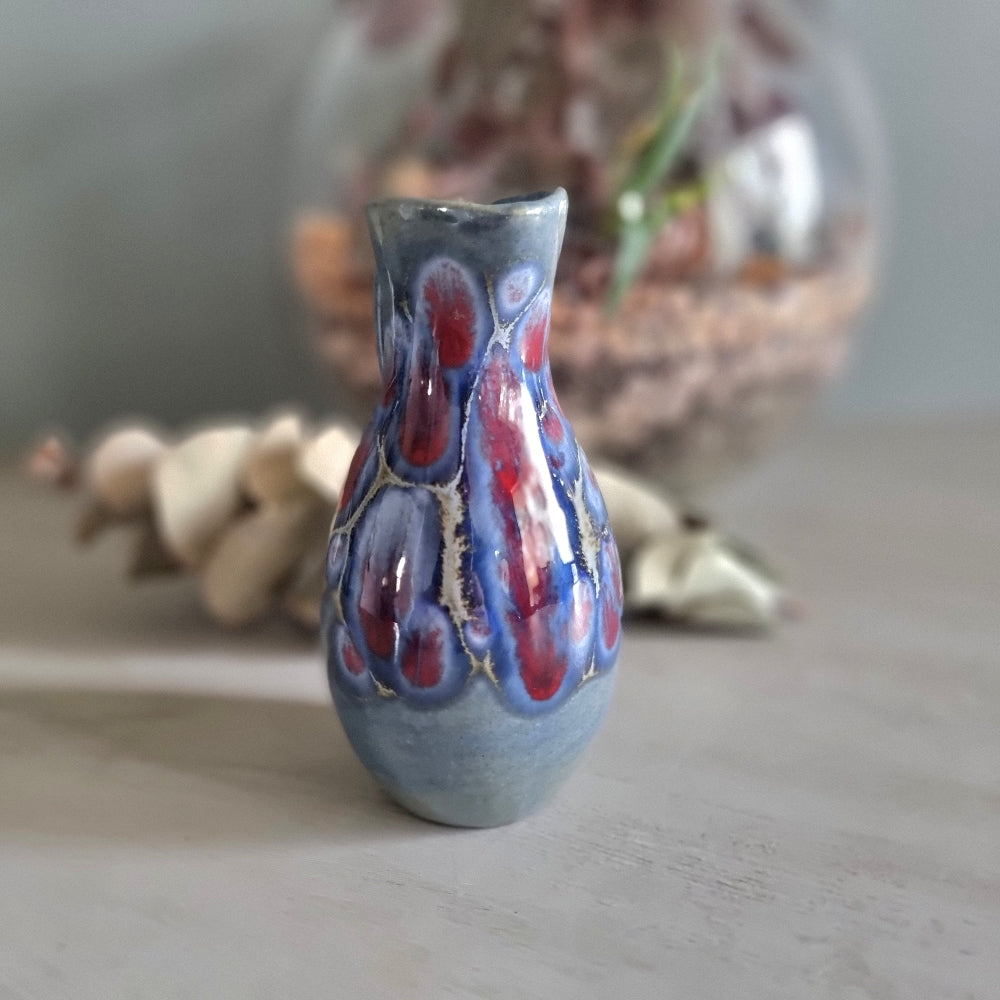 Vintage blue and red glaze studio pottery jug