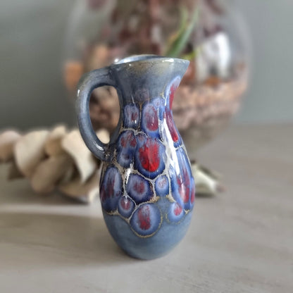 Vintage blue and red glaze studio pottery jug