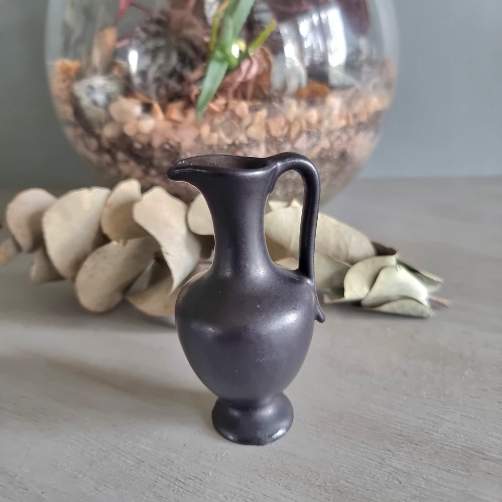 Vintage matte black amphora-style ceramic jug
