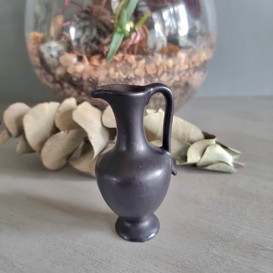 Vintage matte black amphora-style ceramic jug