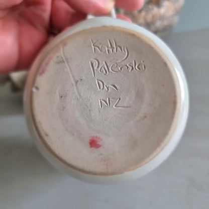 Vintage Kathy Palenski NZ studio pottery creamer jug with pōhutukawa flower design