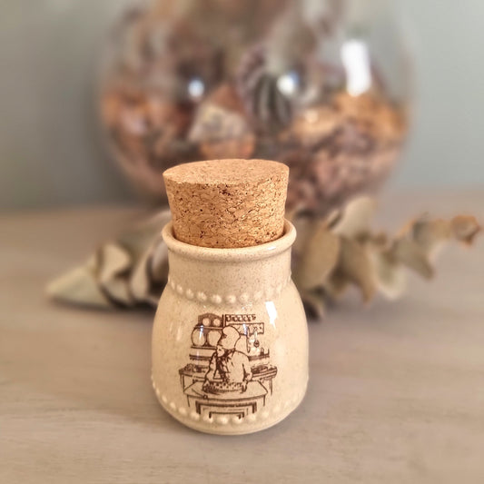 Vintage Crown Lynn New Zealand pottery jar with cork stopper and printed baker illustration