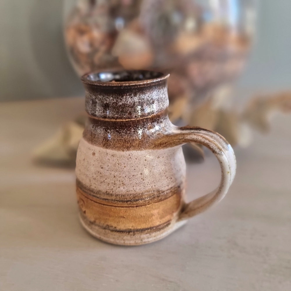 Vintage stoneware mint sauce jug with handle and brown drip glaze