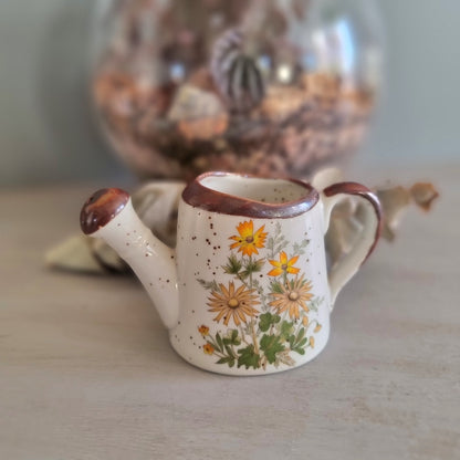 Vintage floral ceramic watering can made in Japan with orange daisy design