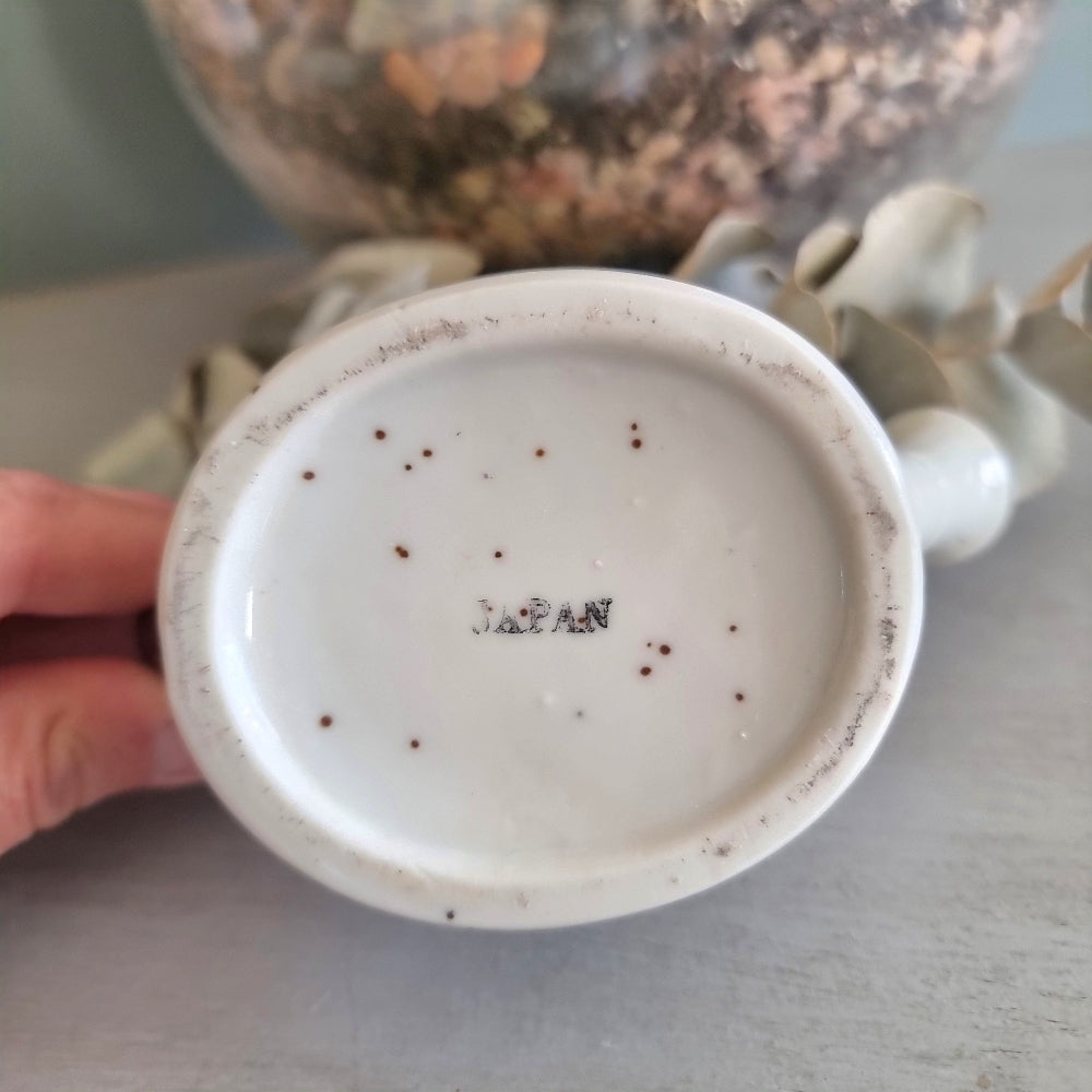 Vintage floral ceramic watering can made in Japan with orange daisy design