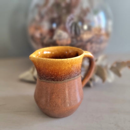 Studio pottery brown glazed jug creamer with pouring spout and handle