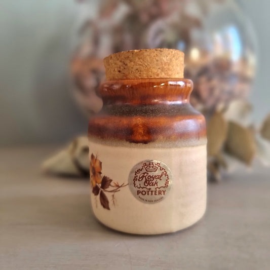 Vintage Royal Oak Pottery cork-top jar with floral print, made in New Zealand