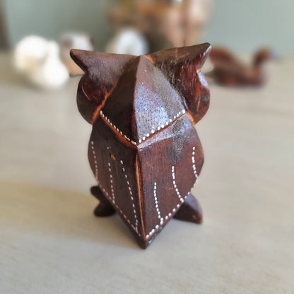 Hand painted carved wooden owl figurine with sunburst wing pattern