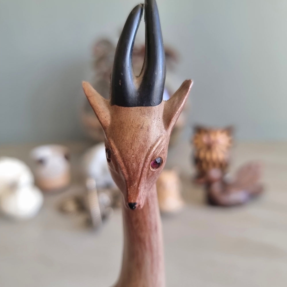 Tall mid century carved wood gazelle figurine with painted horns