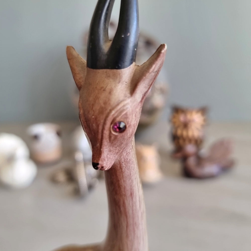 Tall mid century carved wood gazelle figurine with painted horns