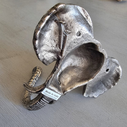 Silver-tone cast metal elephant head wall hook with textured detailing