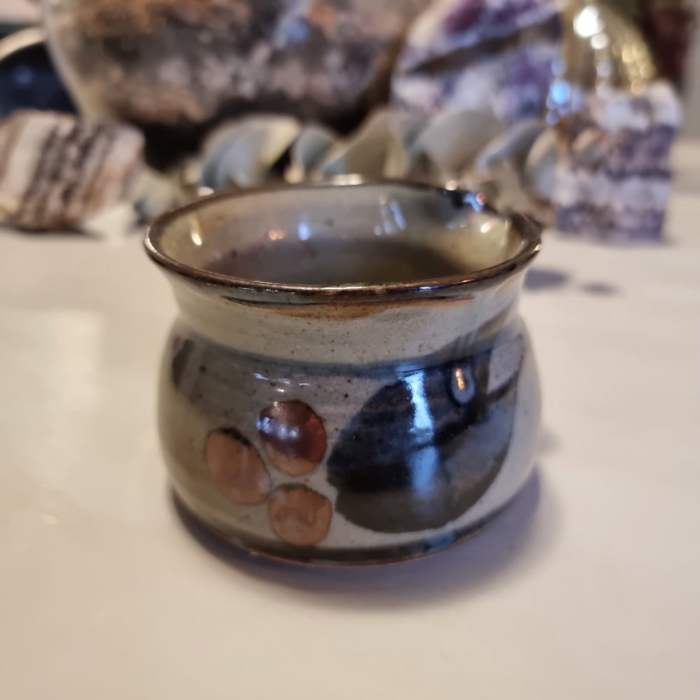 Norfolk Island studio pottery gravy jug with grey-blue glaze, abstract brushwork and rust-orange dots, stamped to base