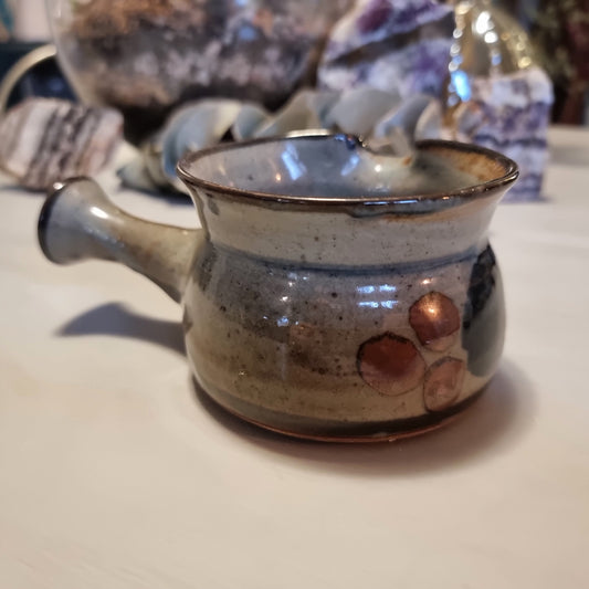 Norfolk Island studio pottery gravy jug with grey-blue glaze, abstract brushwork and rust-orange dots, stamped to base
