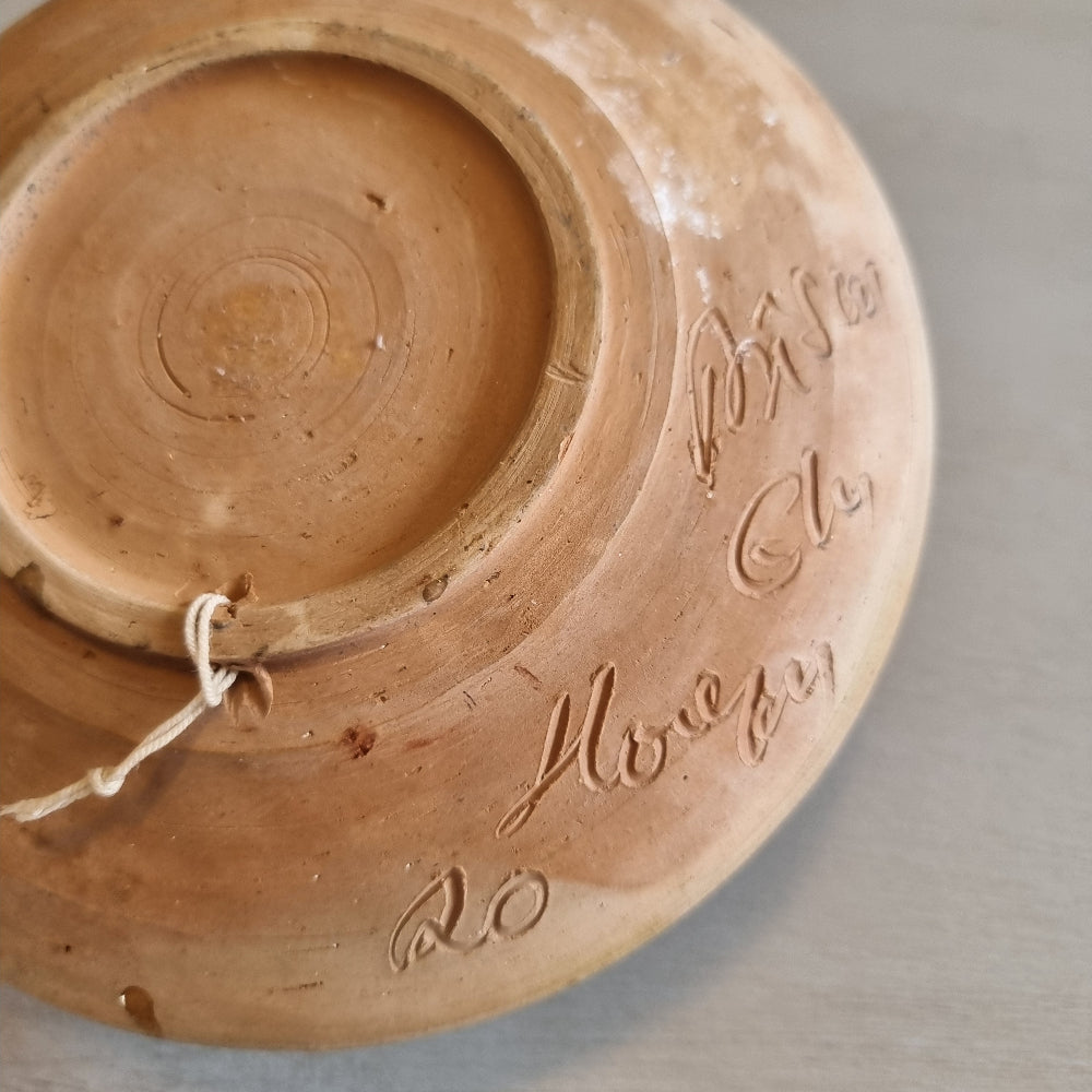 Horezu Romanian marbled clay dish with a swirled glaze and rose motifs