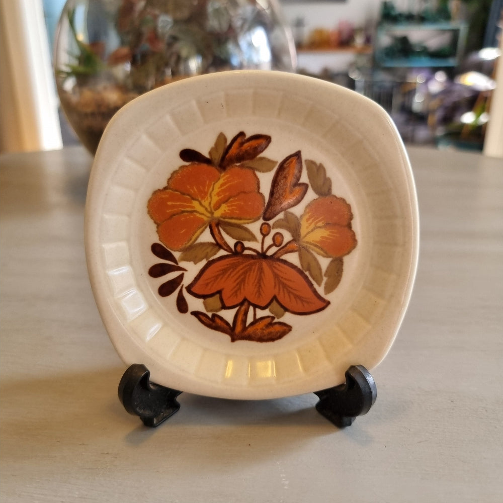 Palissy square edged dish with an autumn floral design