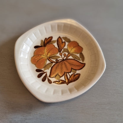 Palissy square edged dish with an autumn floral design