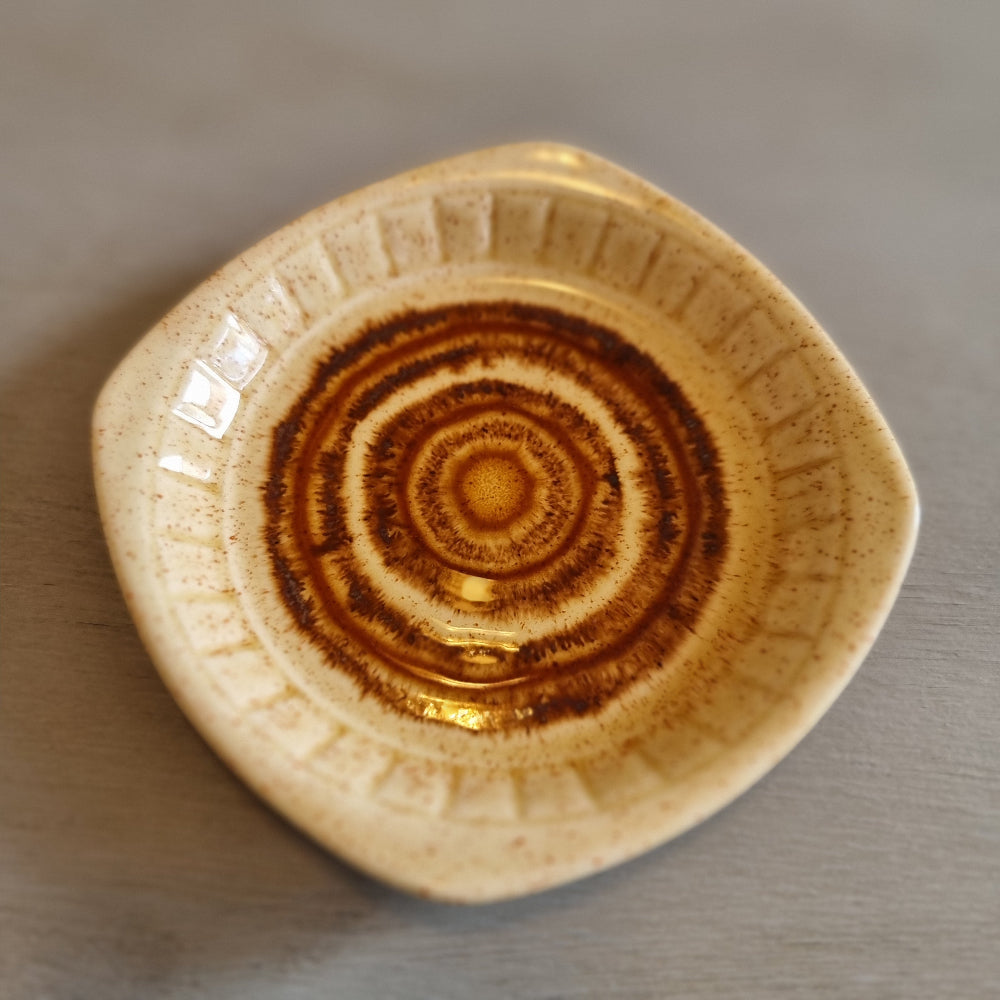 Palissy square edged dish with a concentric brown drip glaze design