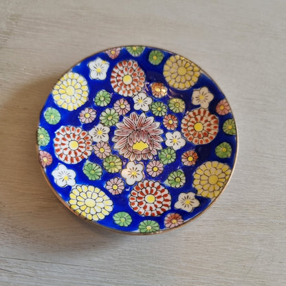 Small Japanese floral plate with a cobalt blue background