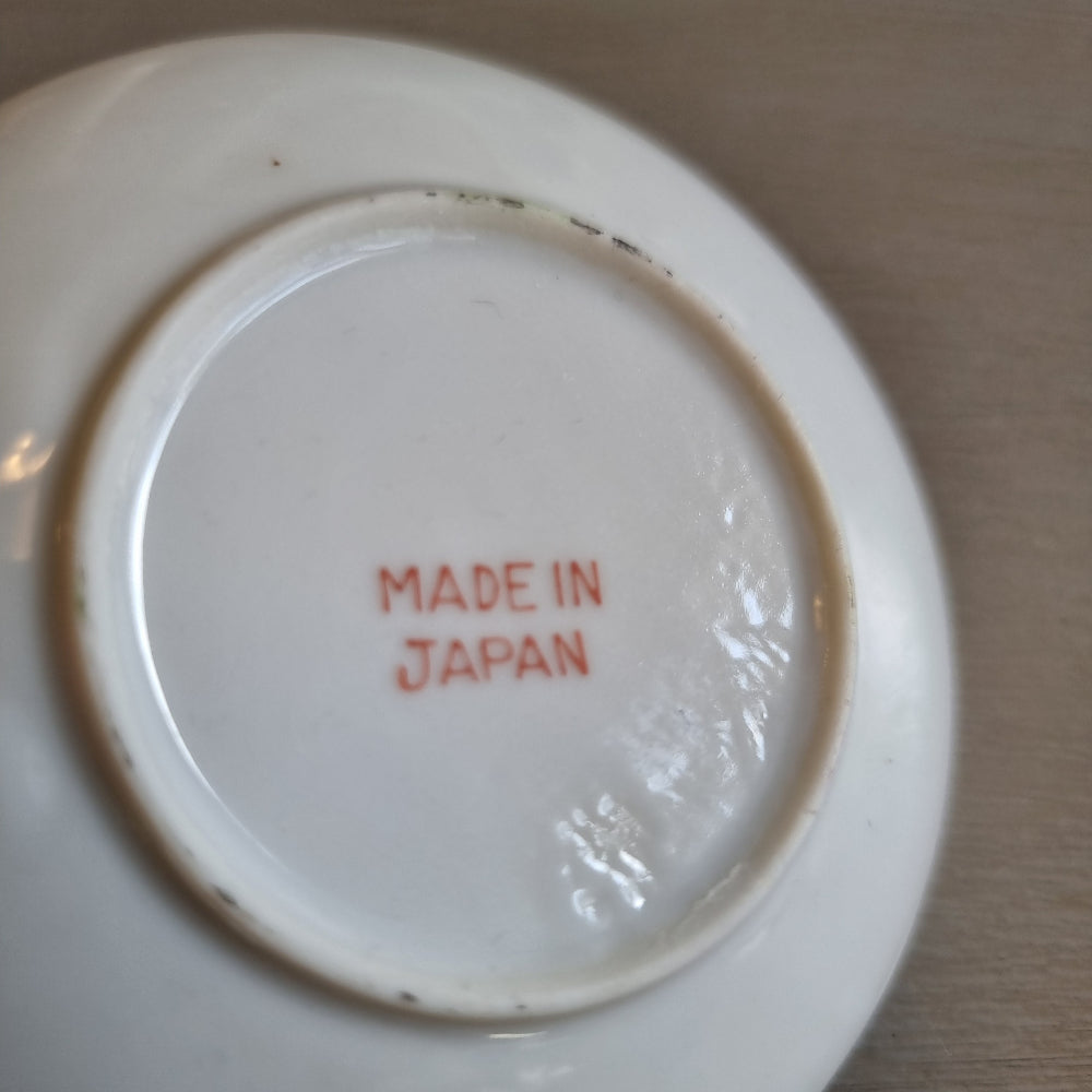 Small Japanese floral plate with a cobalt blue background