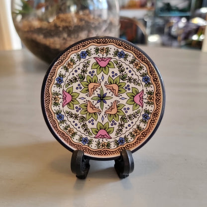 Small floral plate with a lattice edge design