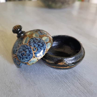 Small lidded trinket pot with a hand painted blue floral design