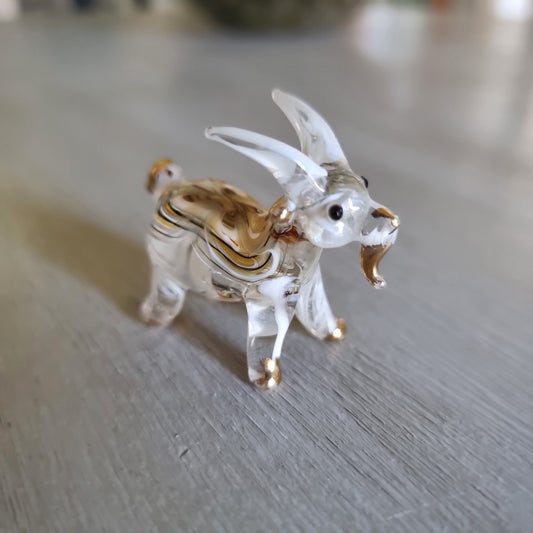 Hand blown glass goat figurine with amber swirl detail