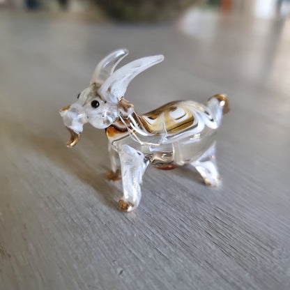 Hand blown glass goat figurine with amber swirl detail