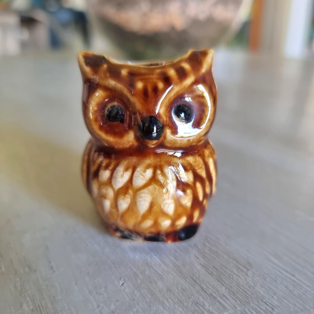 Ceramic owl toothpick holder with a brown drip glaze