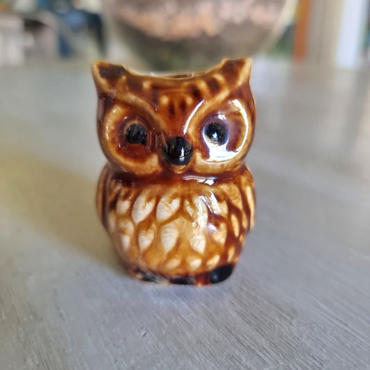 Ceramic owl toothpick holder with a brown drip glaze