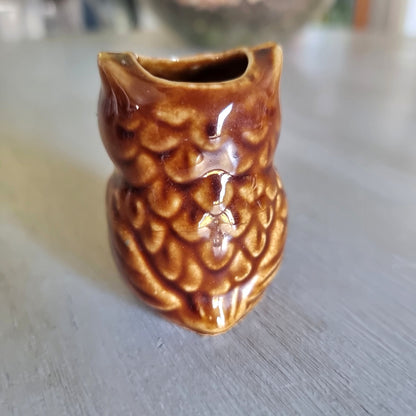 Ceramic owl toothpick holder with a brown drip glaze