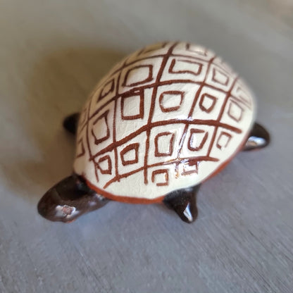Ceramic turtle trinket dish with a geometric shell pattern