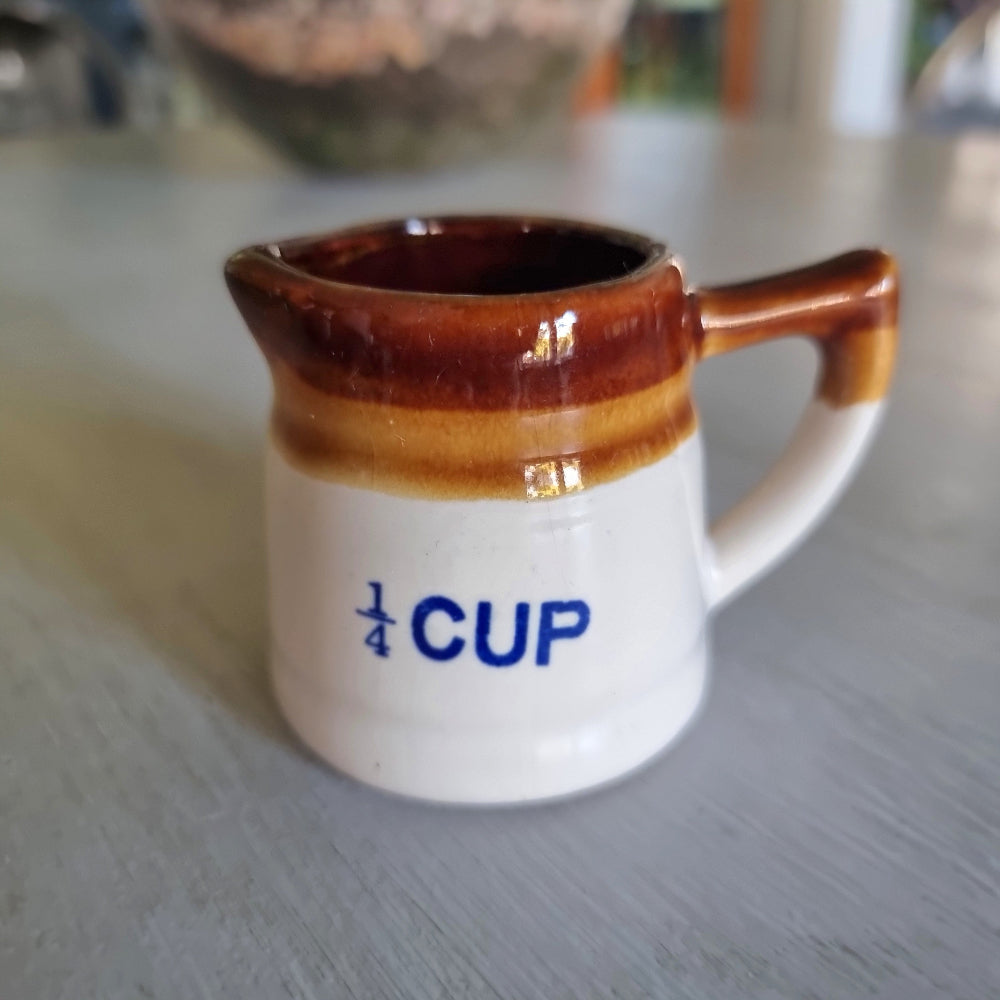 Vintage brown drip glaze quarter cup measuring jug with pouring spout. Part of this week's Curious Finds mini treasures drop.