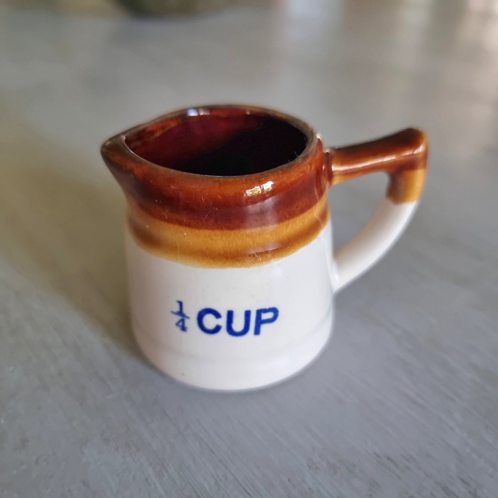 Vintage brown drip glaze quarter cup measuring jug with pouring spout. Part of this week's Curious Finds mini treasures drop.