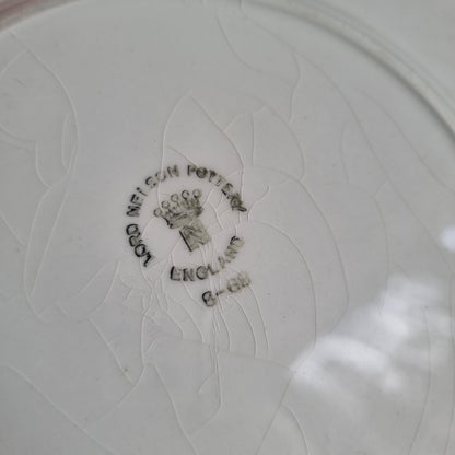 Vintage Lord Nelson Pottery plate with an embossed scroll border, pale blue band and blue and pink flowers