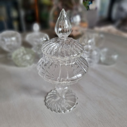 Tall clear glass Mathilde M. Comtesse style bonbonnière with ribbed teardrop finial, swirl ribbed lid and scalloped foot