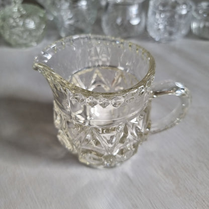Vintage Bagley Empress pattern clear pressed glass cream jug with thumbprint and star panels and a beaded rim