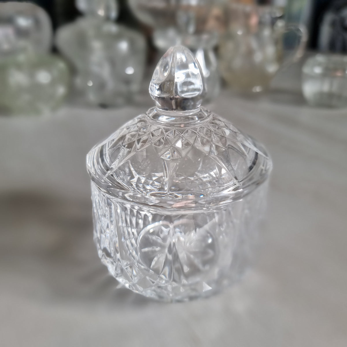 Vintage Cristal d'Arques French cut crystal lidded trinket pot with diamond band, arched cuts and faceted knob lid
