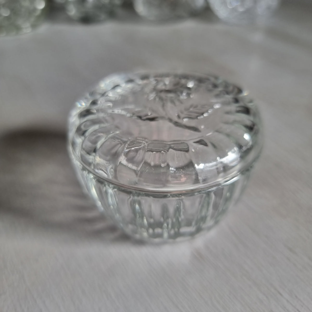 Vintage Luigi Bormioli clear glass rose trinket box made in Italy, with a raised rose lid and ribbed base