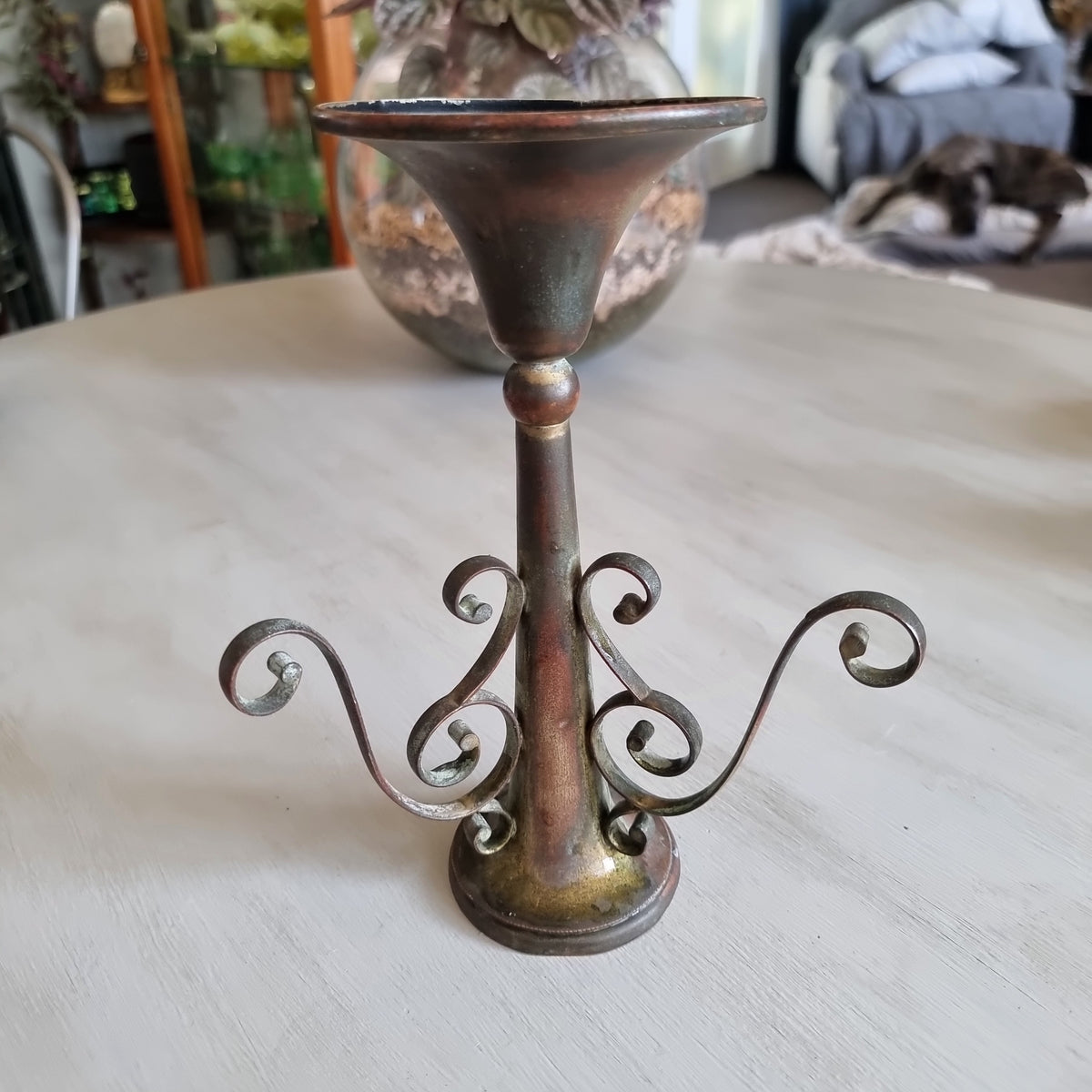 Walter Oxley Sheffield silver plated epergne trumpet vase with curling scroll base, worn back to warm copper tones