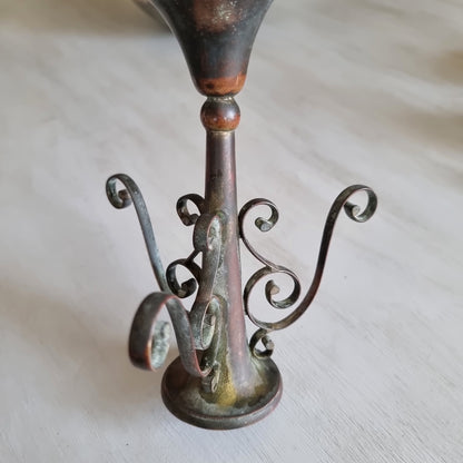 Walter Oxley Sheffield silver plated epergne trumpet vase with curling scroll base, worn back to warm copper tones