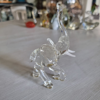 Vintage clear blown glass elephant figurine with trunk raised