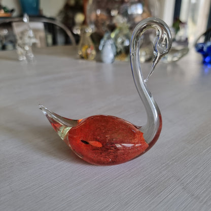 Vintage blown glass swan with amber-red glass body and clear glass neck