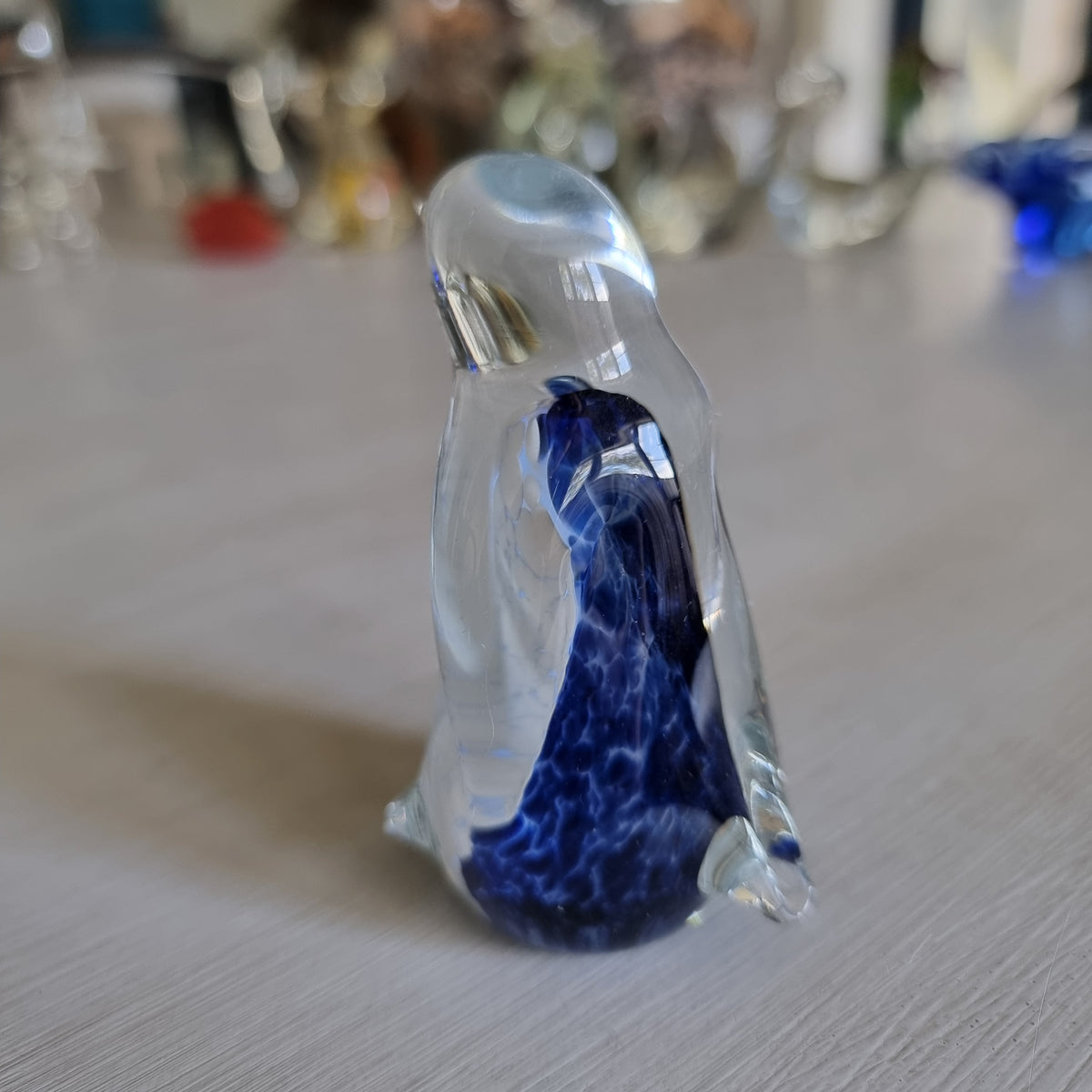Hoglund art glass penguin, signed, small chip to beak