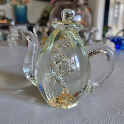 Vintage green-tinted blown glass teapot ornament with gold fleck detail