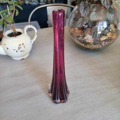 Tall vintage purple glass bud vase with ribbed sides and a heavy clear glass base