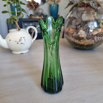 Vintage deep green swung glass vase with ribbed sides and tall pointed rim