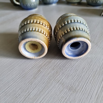 Pair of Wade Irish porcelain salt and pepper shakers in blue and brown glaze with raised beaded bands
